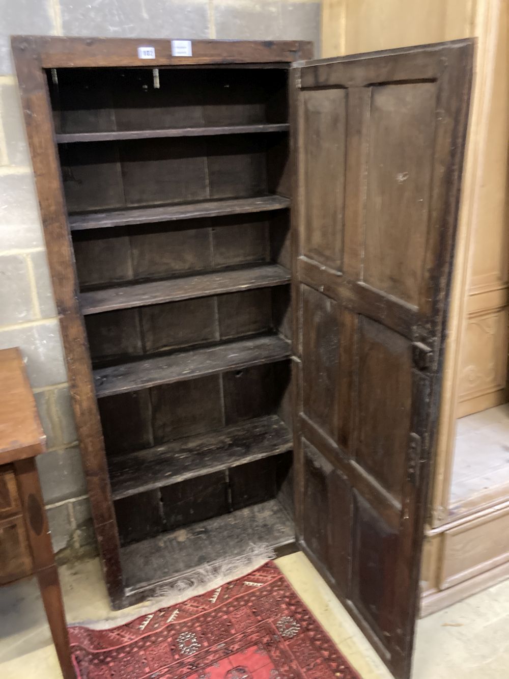 An 18th century panelled oak cupboard, width 74cm depth 30cm height 166cm - Image 2 of 3