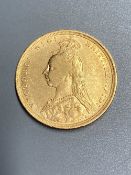 A Victoria 1889 gold sovereign, F or better.