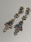 A pair of 1920's/1930's French white metal, white and blue paste set drop earrings, 61mm.