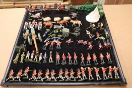 A collection of painted Britains and Holocast lead soldiers, artillery pieces, including some rare