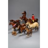 A collection of four various Beswick model horses including Highland, Another Bunch and Another