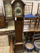 A 1930's oak cased eight day striking and chiming longcase clock, height 169cm