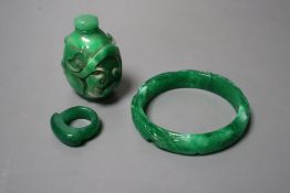 A Chinese green jadeite snuff bottle and stopper, a similar 'phoenix & dragon' bangle and an