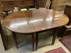 A George III mahogany D end extending dining table, 240cm extended (three spare leaves), width 121cm