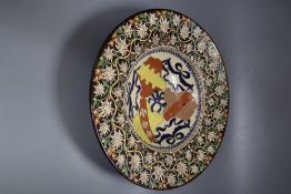 A Swiss Thoune 'peasant' pottery dish, 37cm