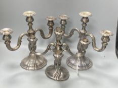 An early 20th century German 925 standard four branch, five light candelabrum, 23.3cm, weighted? and