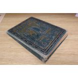 A Victorian scrap album, containing chromolithographic cards and scraps and pressed leaves and two
