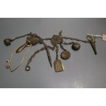 A Victorian embossed metal chatelaine, with seven attached domestic accessories, height 36cm