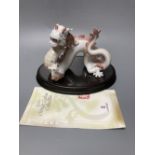 A Lladro porcelain model of a dragon, from the Chinese Zodiac collection, designed by John