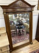 An Empire style mahogany gilt metal mounted overmantel mirror, width 125cm height 190cm