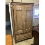 A 19th century French pine two door armoire, width 105cm depth 49cm height 195cm