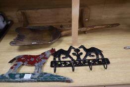 A 19th century sycamore grain shovel, 98cm., a beech wall shelf and two painted sheet metal