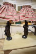 A pair of patinated spelter figural table lamps, male and female water carriers, 57cm excluding