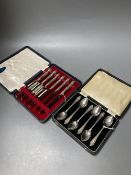 A cased set of six 1930's silver teaspoons and a cased set of six silver handled cake knives.