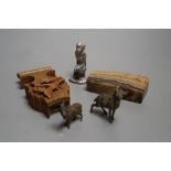 A carved boxwood watch stand, two cold painted bronze goats, an agate paperweight and a cast