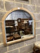 A Victorian pine framed arched wall mirror, width 90cm height 81cm