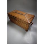 An early Victorian rosewood sarcophagus shaped two division tea caddy, width 30cm