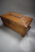 An early Victorian rosewood sarcophagus shaped two division tea caddy, width 30cm