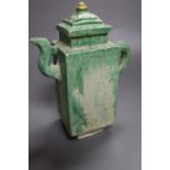 A Chinese green glazed square tea or wine pot, Ming dynasty, 18cm high