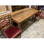 A Swedish dining table and four chairs, table 270cm extended (two spare leaves) width 80cm height