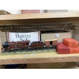A Hornby 'O' gauge Royal Scot 6100 clockwork locomotive and tender, two no. 31 coaches and a Flat