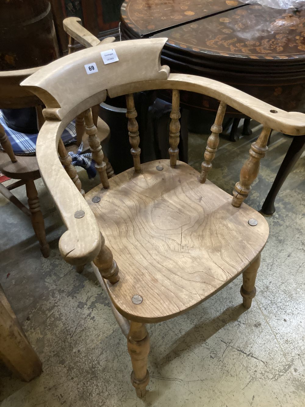 Two Victorian elm and beech smoker's bow elbow chairs together with six Windsor kitchen chairs