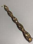 A continental 935 gilt metal and oval and round cut citrine and paste? set bracelet, with