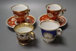 A pair of Chamberlain rare shaped cups and saucer, the handle with animal heads and two