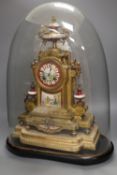 A 19th century French Louis XV style gilt spelter and porcelain mounted eight day mantel clock, on