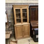 A Victorian pine bookcase, width 104cm depth 47cm height 209cm