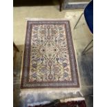 A small Eastern rug, 134 x 91cm