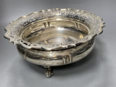 A George V silver circular fruit bowl with pierced border, Goldsmiths & Silversmiths Co Ltd, London,
