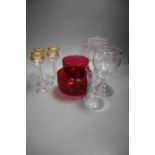 A pair of cranberry rinsers, four airtwist gilt decorated glasses, a Greek key patterned wine glass,