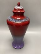 A Poole pottery flambe vase and cover, inspired by Ruskin and made for the V & A Arts and Crafts