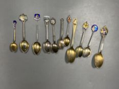 Six 20th century assorted silver and enamel souvenir spoons, gross 81 grams and five similar white