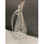 A contemporary Reidel glass jug, signed, height 39cm