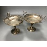 A pair of George V silver two handled tazze, Birmingham, 1910, height 16.3cm, 15oz.CONDITION: One