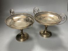 A pair of George V silver two handled tazze, Birmingham, 1910, height 16.3cm, 15oz.CONDITION: One