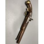 A 19th century percussion cap pistol (incomplete), length 39cm