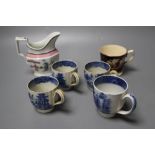 Four pearlware coffee cups and a pottery mug and a porcellaneous jug with oriental figures,11cm