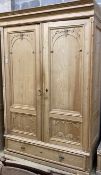A 19th century French pine two door 'knockdown wardrobe' with drawer and base, width 156cm depth