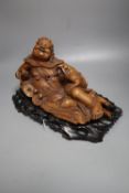 A Chinese hardwood group of Liu Hai and his three legged toad, early 20th century, together with