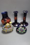 A Moorcroft bulbous vase and a pair of candlesticks, Pomegranate pattern, 18cm, a modern Moorcroft