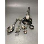 Two 19th century caddy spoons, including one silver and one Dutch white metal, silver napkin ring, a