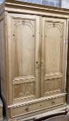 A 19th century French pine two door 'knockdown wardrobe' with drawer and base, width 158cm depth