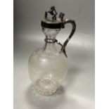 A Victorian silver mounted etched glass claret jug, of bulbous form, with rampant lion finial,