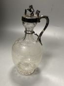 A Victorian silver mounted etched glass claret jug, of bulbous form, with rampant lion finial,