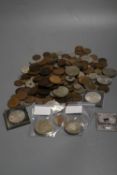 A small collection of coins, including a Tibet, Guang Xu, Szechuan, Rupee, 1902-11, a 1780 Thaler