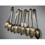 Eight assorted late 18th century silver Old English pattern tablespoons and an early 19th century