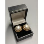 A pair of 20th century yellow metal and mabe pearl earrings, 21mm, one butterfly missing, gross 10.8